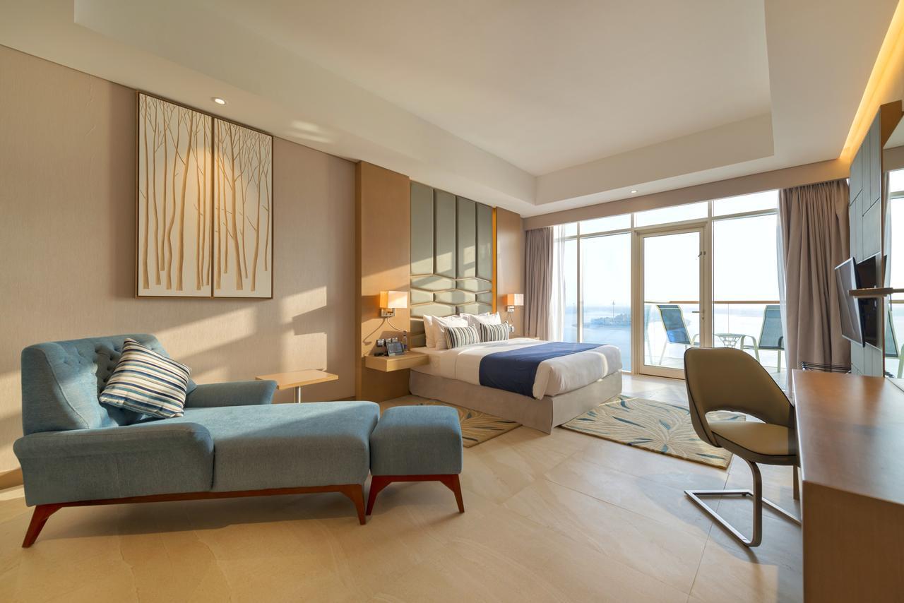 One-Bedroom Suite With Sea View and Hotel Private Beach Access,670373304:JPEG